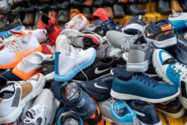 New Delhi, India - November 17, 2019: Piles of mens knock off de