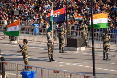 Attari, India - Febuary 8, 2020: Indian Border Security Force members start the parade at the Wagah Border Closing ceremony with Pakistan