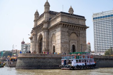 Mumbai, India - February 29, 2020: Ferry harbor of Mumbai with a view of the Gateway of India