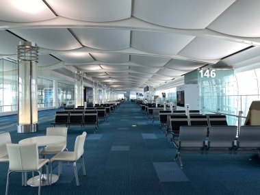 Tokyo, Japonya - 30 Mart 2020 'de Coronavirus COVID-19 pandemik tecrit sırasında HND Haneda Uluslararası Havalimanı' nın boş kapısında. Toyko Japonya 'da yurt içi ve uluslararası uçuşlara yasak