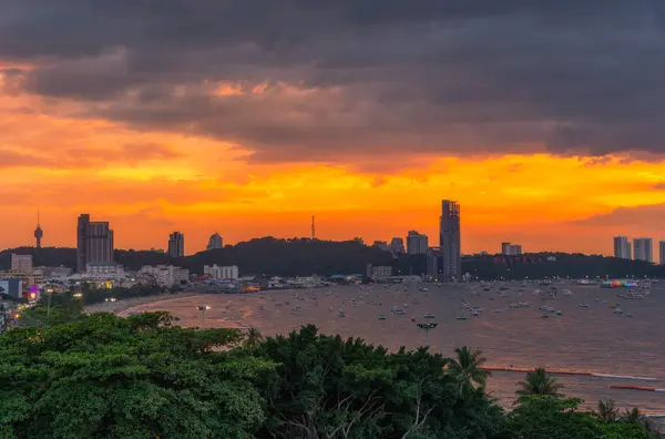 Pattaya City and Sea with sunrise, Thailand. Pattaya city skyline and pier at sunset in Pattaya Chonburi Thailand
