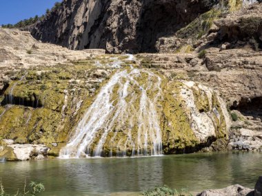 Güzel Darbat şelalesi, iki katı var ve birkaç göl oluşturuyor. Umman.
