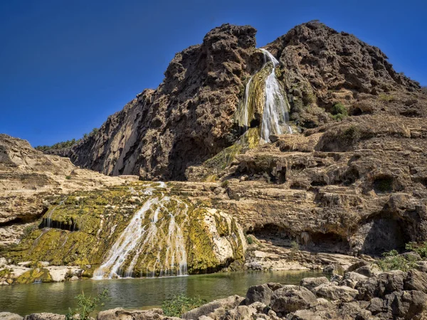 Beautiful Darbat waterfall, has two floors and forms several lagoon. Oman