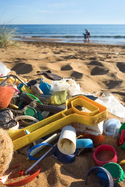 Plastic garbage collected on the beach. Ocean plastic pollution concept.