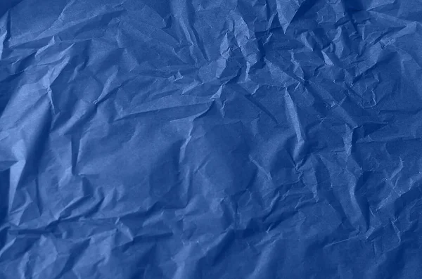 Strukturiertes zerknülltes Papier in blau. Hintergrund für Ihr Design. getöntes Papier. — Stockfoto