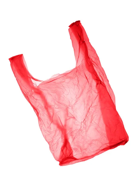 Красно-розовый пластиковый пакет на белом фоне. Isolated — стоковое фото