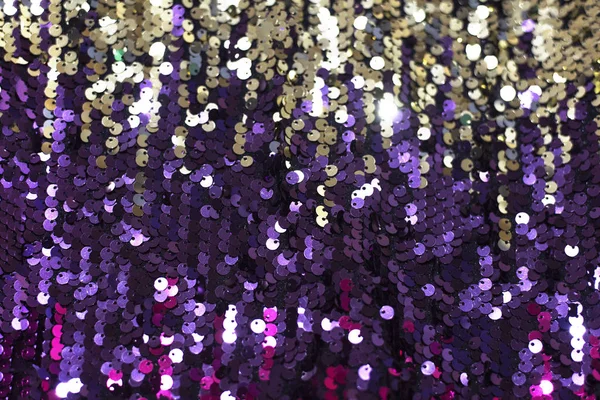 Celebratory background with sequins of golden-violet color. — Stock Photo, Image