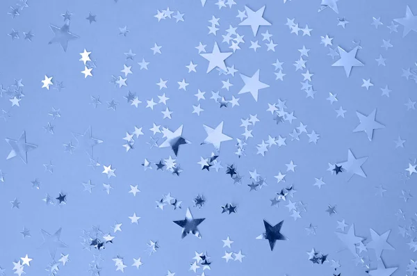 Klassisch blauer Hintergrund mit Konfetti-Sternen. — Stockfoto