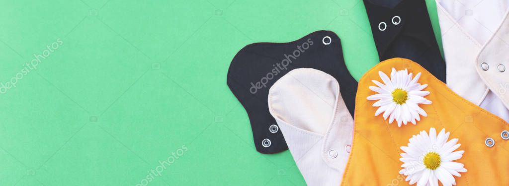 Banner with environmental womens pads on a green background.