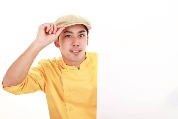 Smiling Asian waiter