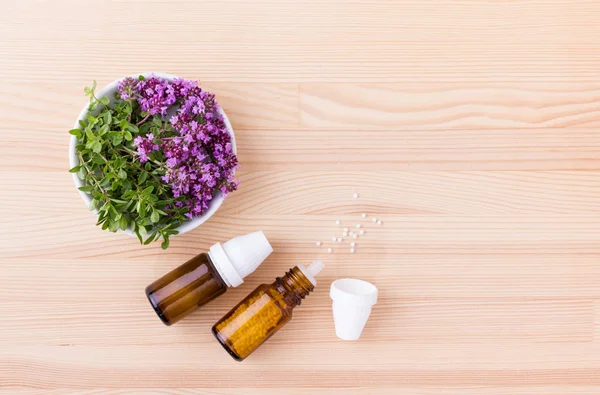 Homeopathic remedy and wild thyme — Stock Photo, Image