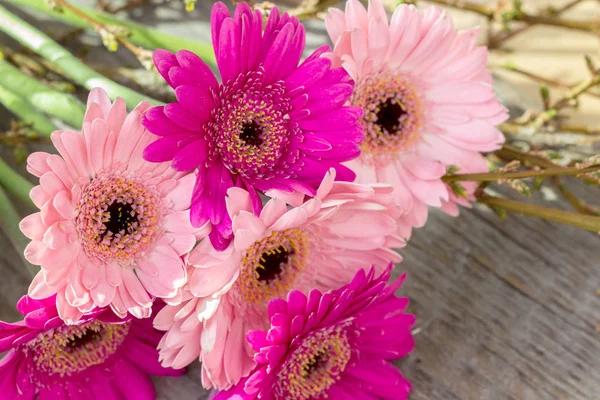 Bouquet Pink Gerbera Twigs Wooden Background — Stock Photo, Image
