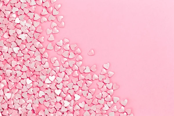 Trendige silbrig glänzende rosa Herzen Hintergrund — Stockfoto