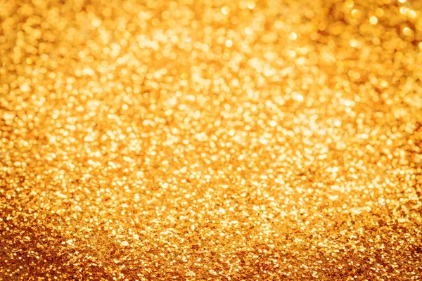 Brillo festivo dorado con fondo bokeh —  Fotos de Stock