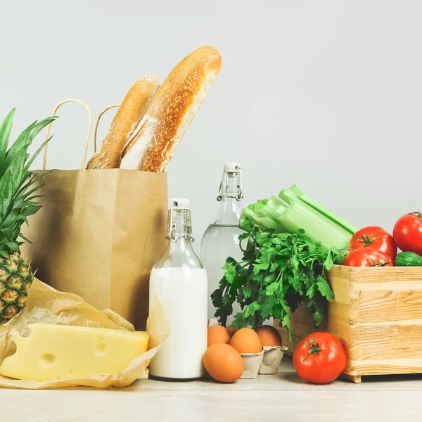 Delivery of grocery. Chest with fresh fruit and vegetables bright green dairy meat produce. Eco friendly responsible lifestyle and shopping. Healthy eating, zero waste concept. Copy space. Donation.