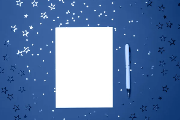 Notebook and pen on blue. — Stock Photo, Image