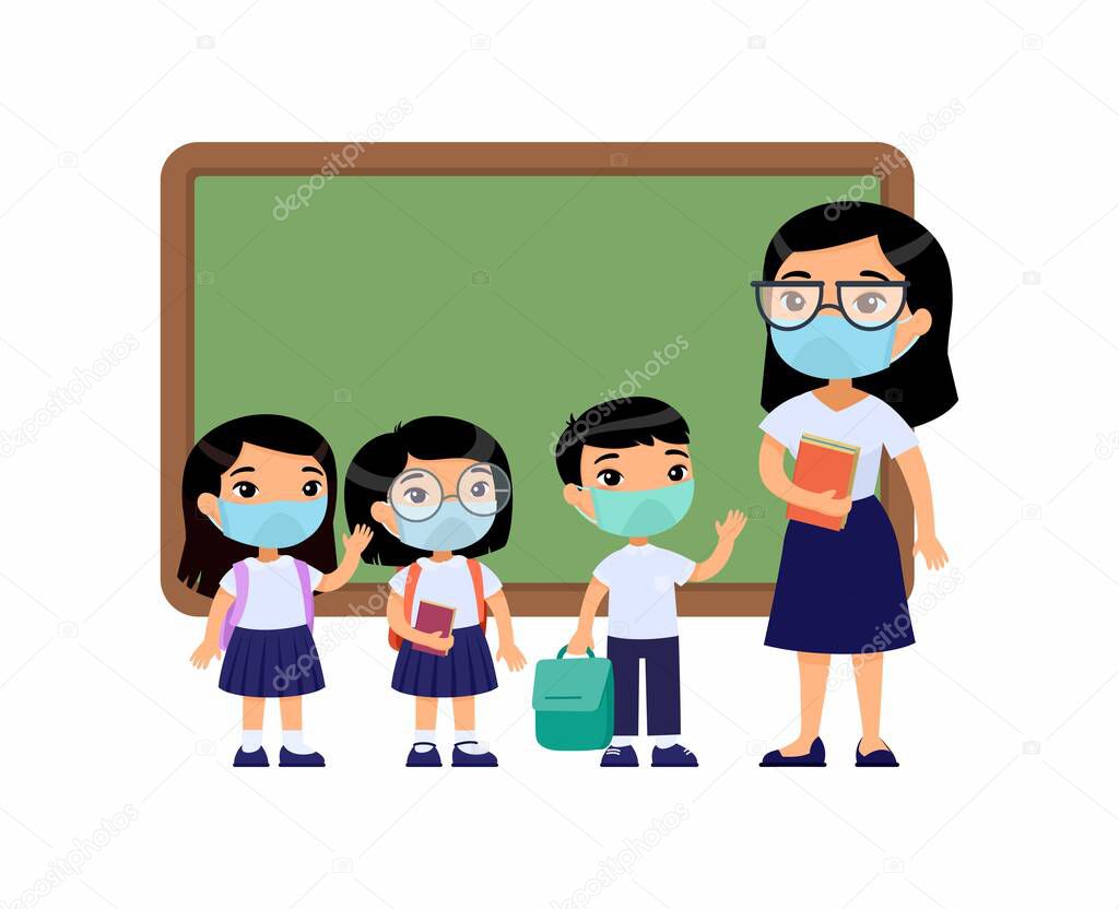 Asian female teacher and pupils  with protective masks on their faces. Boys and girls dressed in school uniform and female teacher pointing at blackboard cartoon characters. Respiratory protection, allergies concept.