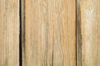 Dikey tahtaları olan eski kahverengi ahşap arkaplan.