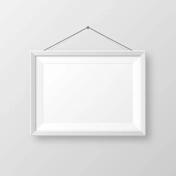 Realista colgando en una pared en blanco marco de imagen con sombra. Moderna maqueta de póster aislada sobre fondo gris. Marco de fotos vacío para galería de arte o interior. Ilustración vectorial . — Archivo Imágenes Vectoriales