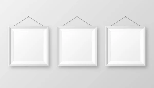 Realistic hanging on a wall blank white picture frame with shadow. Modern poster mockup isolated on gray background. Empty photo frame for art gallery or interior. Vector illustration. — 스톡 벡터