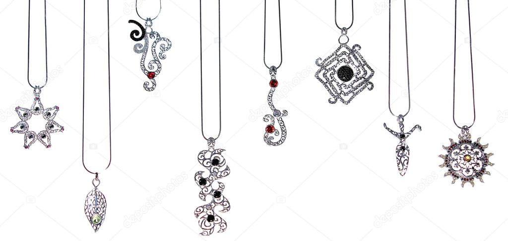 Assortment of women's jewelry, white background