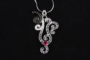Assortment of women's jewelry, white background