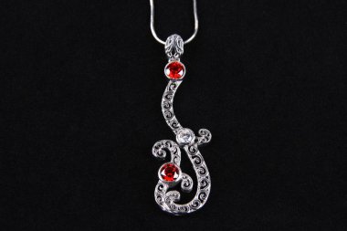 Assortment of women's jewelry, white background