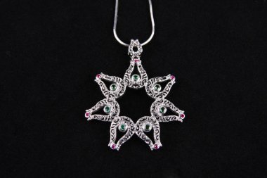 Assortment of women's jewelry, white background