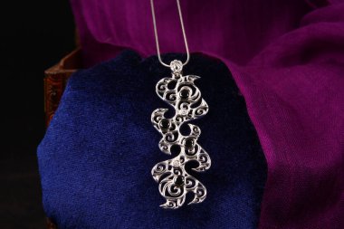 Assortment of women's jewelry, white background