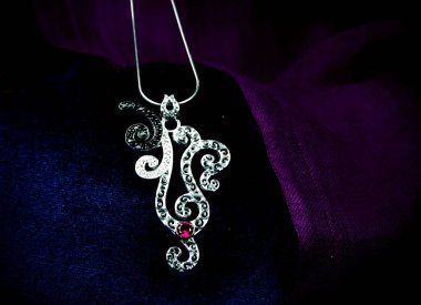 Assortment of women's jewelry, white background