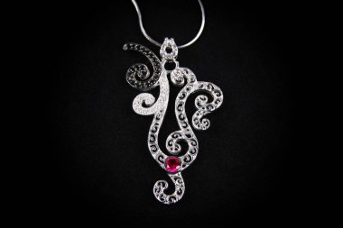 Assortment of women's jewelry, white background