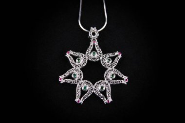Assortment of women's jewelry, white background