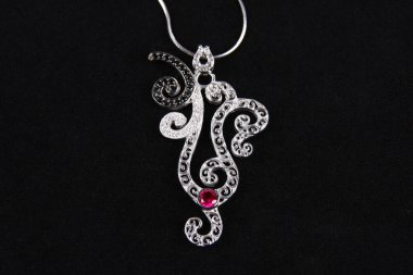 Assortment of women's jewelry, white background