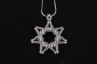 Assortment of women's jewelry, white background