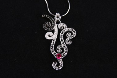 Assortment of women's jewelry, white background