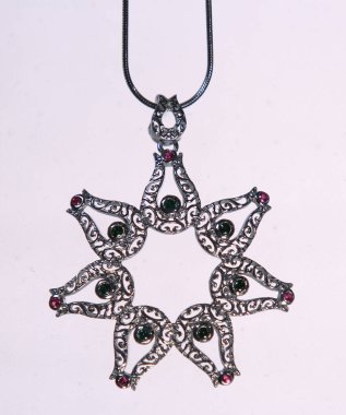Assortment of women's jewelry, white background