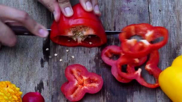 Close Hand Chef Cutting Bell Pepper — Stock Video