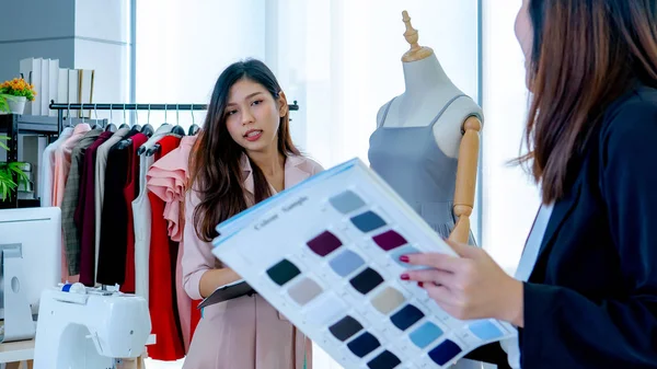 Two young designer start up a garment business