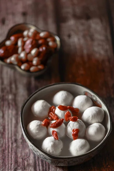 Tangyuan ,Red dates , peanuts, red dates, Wolfberry  on the table 