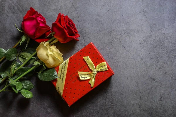 Valentine\'s Day still life: roses and gift box