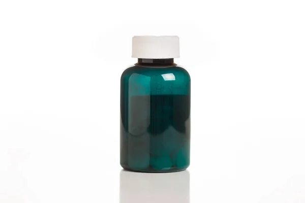 Μπουκάλι Πράσινο Χάπι Που Απομονώνονται Ένα Φόντο — Φωτογραφία Αρχείου