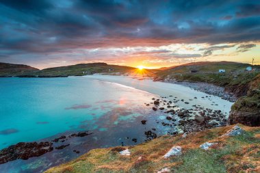 Sunset over the beach at Hushinish on the Isle of Harris in the Outer Hebrides of Scotland clipart