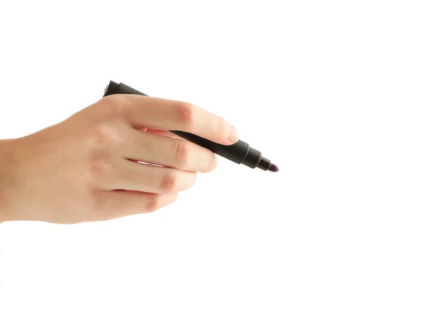 A hand holding a black marker on white background Stock Picture