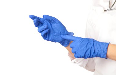 Doktor steril mavi eldivenler giyiyor. Beyaz arka planda izole edilmiş. Üst görünüm