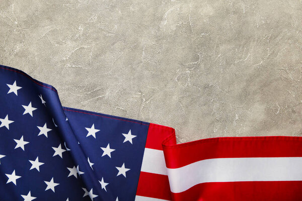 American flag on grey concrete background. Independence day