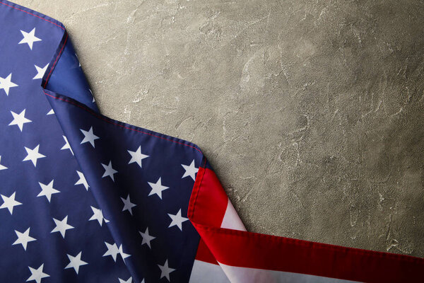 American flag on grey concrete background. Independence day