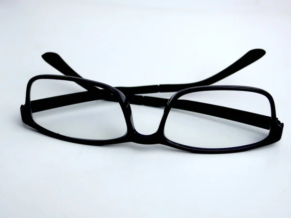 Schwarze Gläser Auf Weißem Speck — Stockfoto