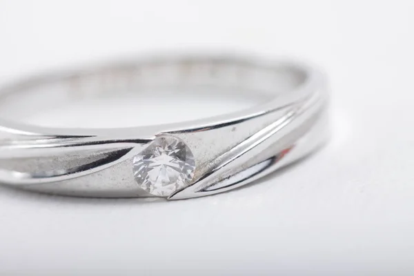 White gold engagement ring with diamonds on an isolated white background