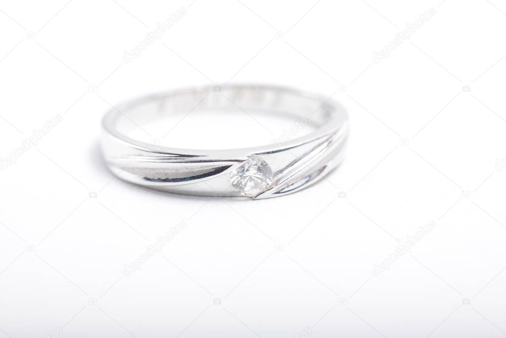 White gold engagement ring with diamonds on an isolated white background