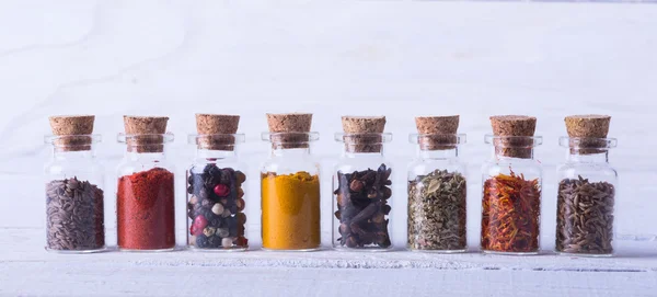 Spices in bottles — Stock Photo, Image